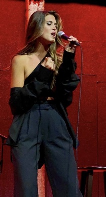 Jessica Altman performing on stage